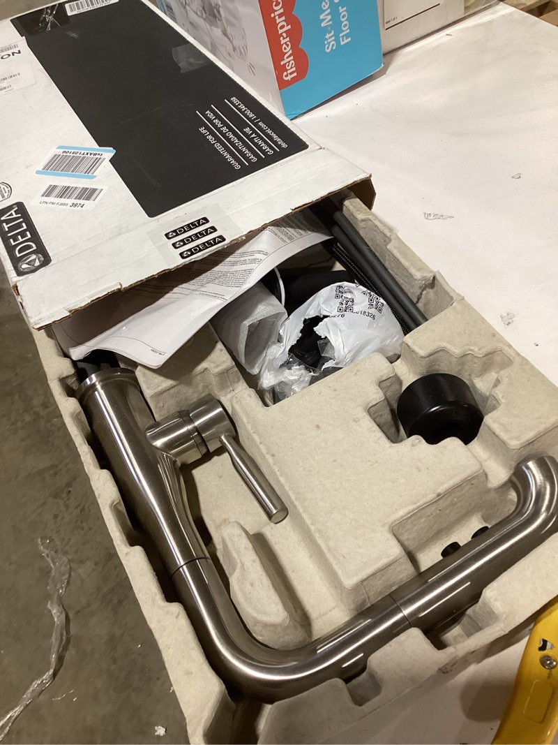 Condition photo showing As Is for Delta Almari Brushed Nickel Kitchen Faucet with Pull-Out Sprayer, Modern Single Hole Kitchen Sink Faucet, Single Handle, Stainless 16943-SS-DST