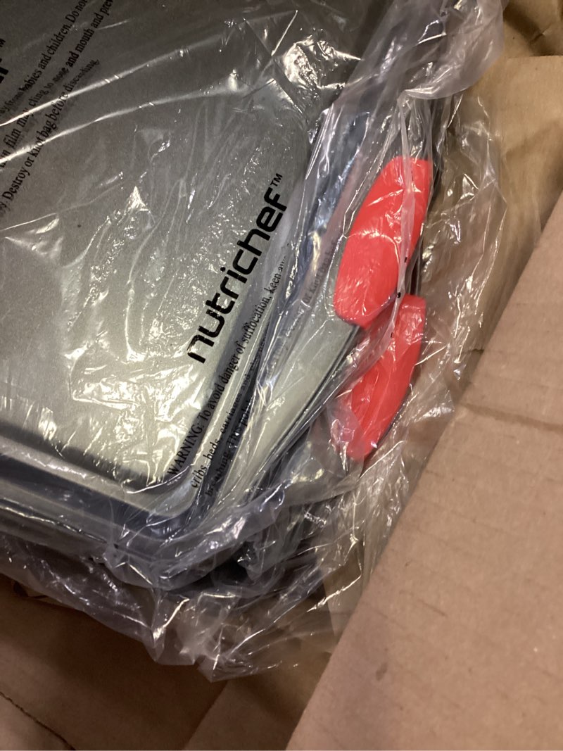 Condition photo showing As Is for nutrichef 3-piece cookie sheets for baking, non-stick baking pans set with silicone handles, stackable oven trays in small, medium & large sizes for professional and everyday use, 2026 edition 3-piece set 2026 edition