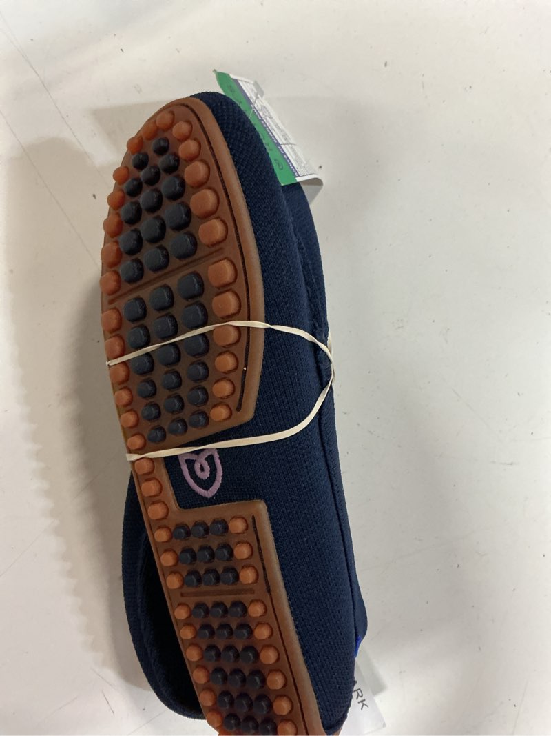 Condition photo showing Good Condition for rothys navy gum shoe loafer size 6