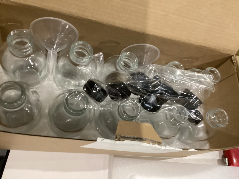 Condition photo showing As Is for 4OZ Small Glass Bottles with Lids and Funnels, 120ml Boston Round Glass Bottles, Leak Proof Mini Travel Bottle, Perfect for Diy Essential Oils, Hot Sauce and Juices, 10 Pack Clear