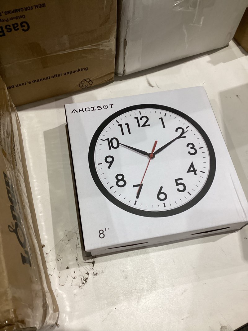 Condition photo showing New/Like New for AKCISOT Wall Clock, Modern Small Wall Clocks Battery Operated 8 Inch, Silent Non-Ticking Analog Classic for Office, Home, Bathroom, Kitchen, Bedroom, School(Black) A_black 8 Inch