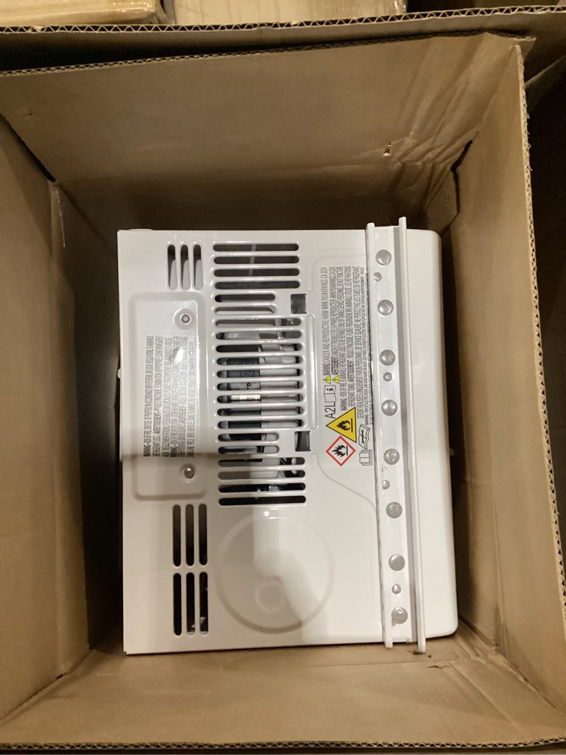 Condition photo showing As Is for **not tested **amazon basics 5000-btu window air conditioner with quiet operation, up to 150 sqf, cool and fan functions, washable filter, adjustable window kit, intuitive mechanical controls, for small room, white white 5000 bt