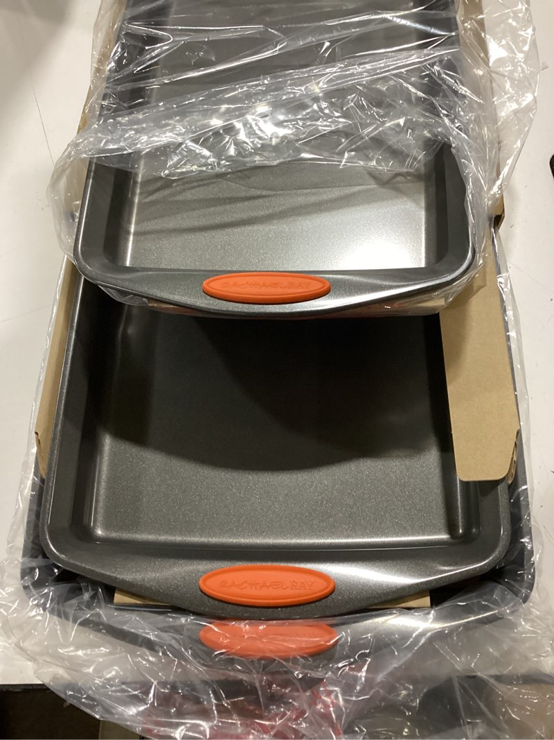 Condition photo showing New/Like New for rachael ray nonstick bakeware set with grips, nonstick cookie sheets / baking sheets - 3 piece, gray with orange grips