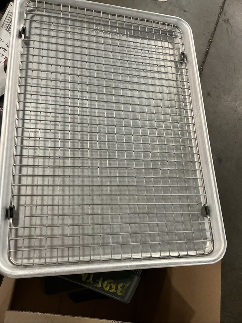 Condition photo showing As Is for half sheet with oven safe nonstick grid, 2 piece set, natural