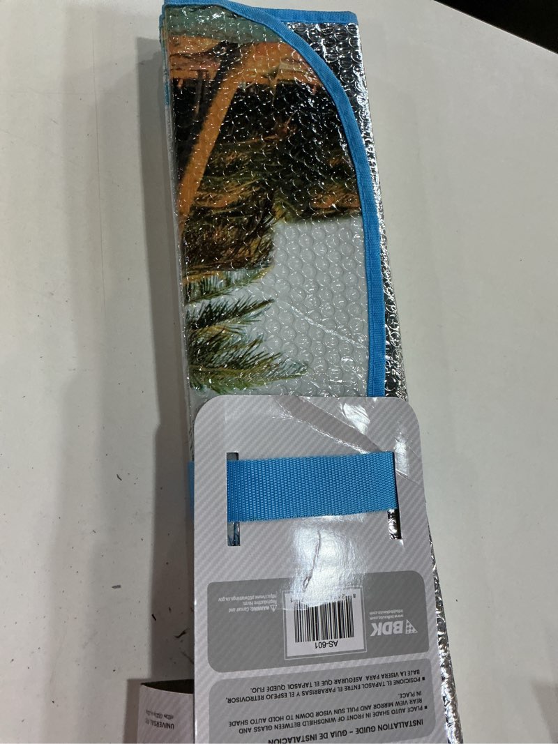 Condition photo showing New/Like New for accordion aluminum foil bubble front sunshade - palm trees on the beach