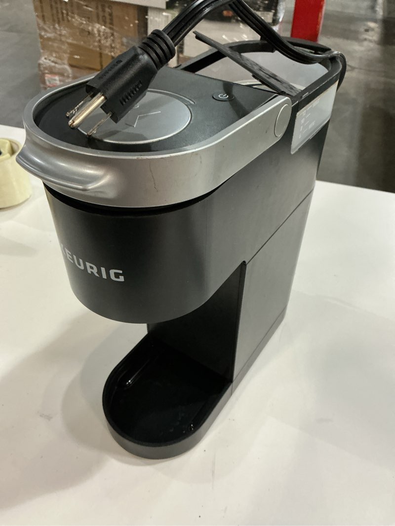 Condition photo showing As Is for Keurig K-Mini Single Serve K-Cup Pod Coffee Maker, 6 to 12oz Brew size, with Cord Storage, Perfect for Small Spaces, Black