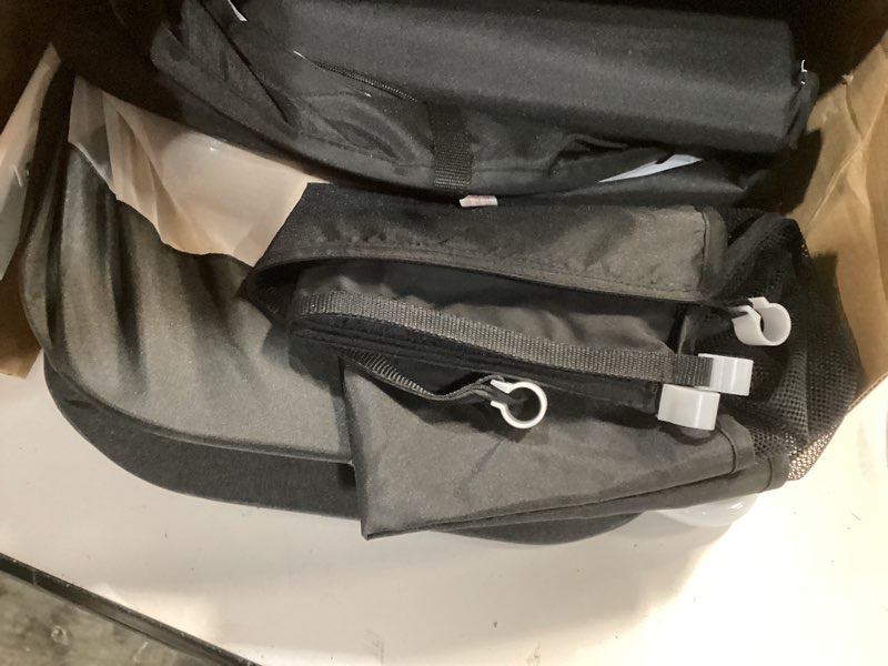 Condition photo showing Good Condition for Dream On Me Karley Bassinet in Black, Lightweight Portable Baby Bassinet, Quick Fold and Easy to Carry, Adjustable Double Canopy, Indoor and Outdoor Bassinet with Large Storage Basket.