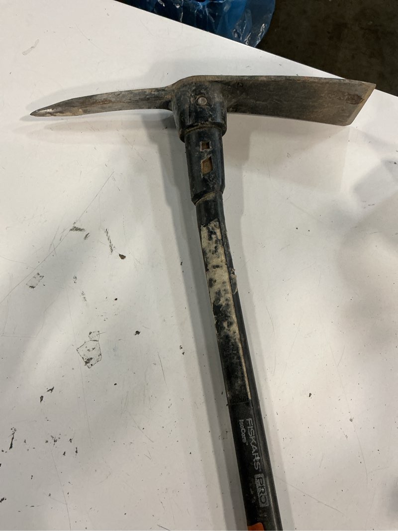 Condition photo showing As Is for pro isocore 5 lb. forged steel pick/mattock with 36 in. steel handle