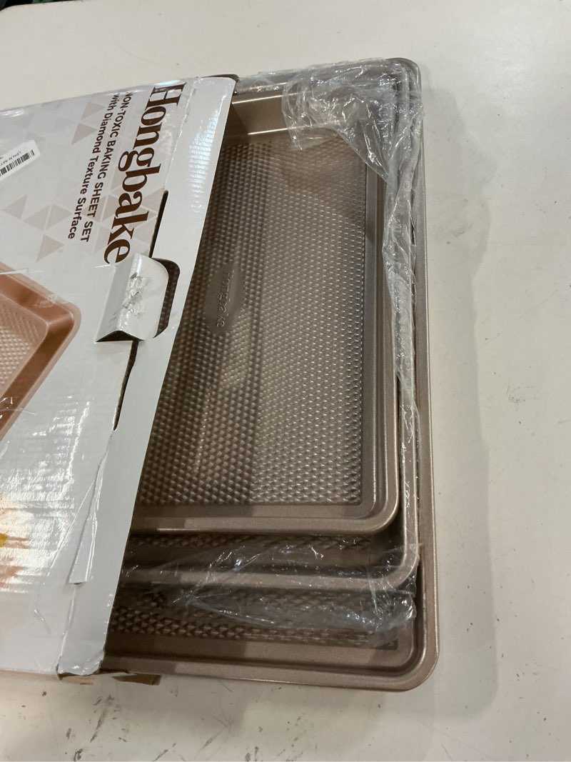 Condition photo showing Good Condition for hongbake baking sheet pan set of 3, cookie sheets for oven, nonstick half/quarter/jelly roll pans with diamond texture pattern, 0.8mm thick heavy duty cookie tray, champagne gold champagne gold (carbon steel)