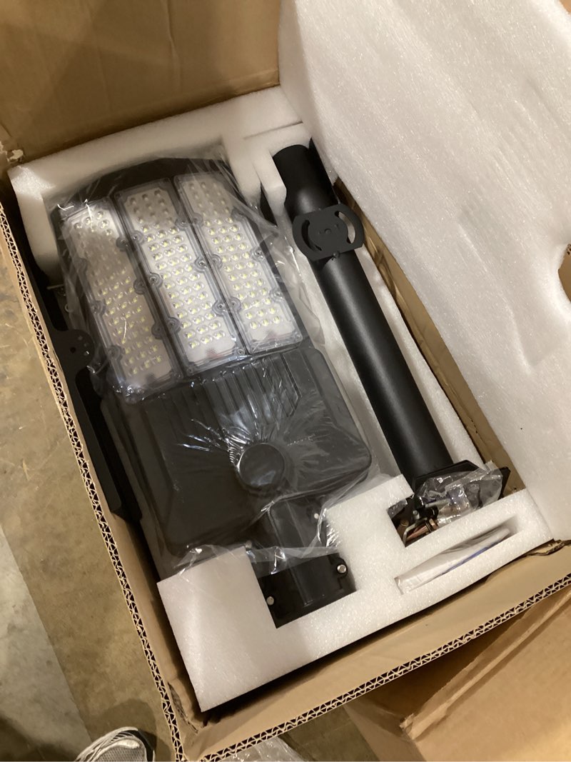 Condition photo showing Good Condition for 10000W Solar Street Light Outdoor, Commercial Grade Outdoor Solar Lights Dusk to Dawn, Large Panel Pro Outside Light with Motion Sensor and Remote, Solar Parking Lot Lights for Yard, Country 2 Pack