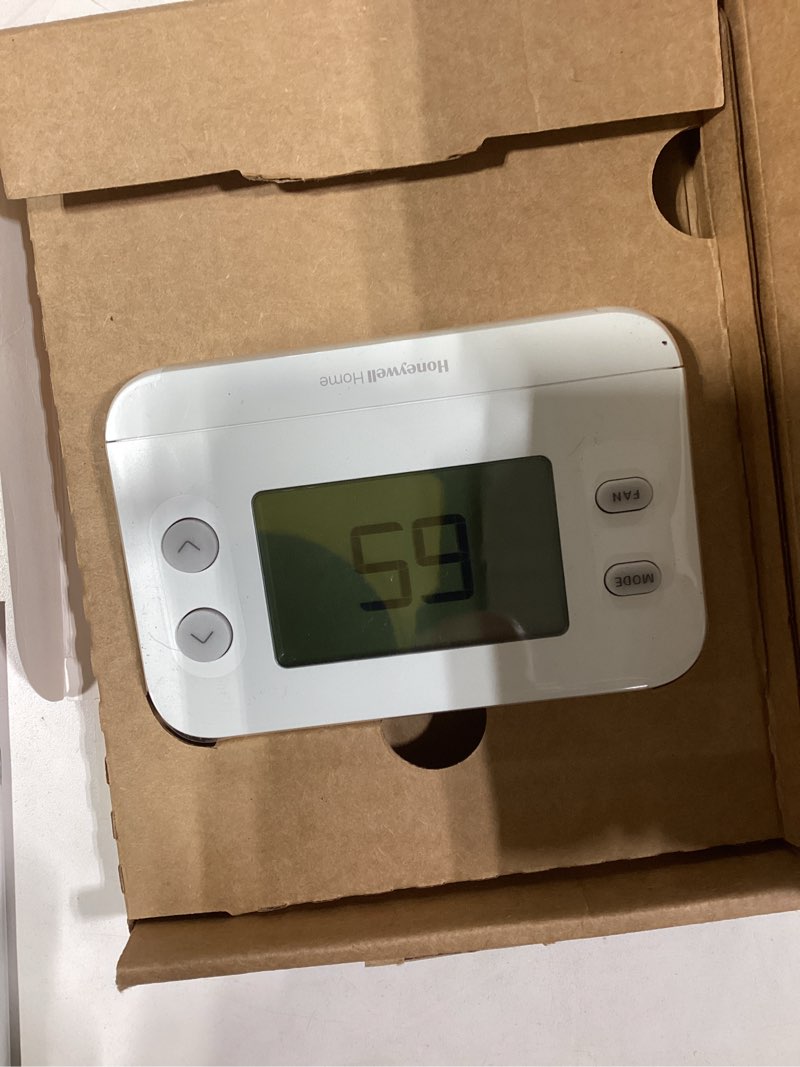 Condition photo showing As Is for New! Honeywell Home Non-Programmable Thermostat, Single-Stage, 1 Heat/1 Cool Compatibility, X1N, White