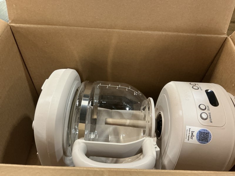 Condition photo showing As Is for bella 12 cup programmable coffee marker, reusable dishwasher safe accessories, easy lcd diaply, auto shutoff, 900 watt, oatmilk