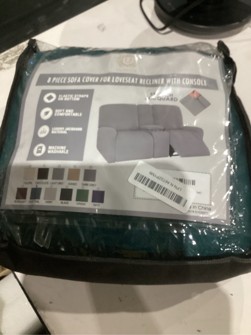 Condition photo showing As Is for ulticor jacquard design reclining loveseat with middle console slipcover, 8-piece stretch sofa covers, 2 seat loveseat recliner cover, washable (deep teal) loveseat with console recliner slipcover deep teal