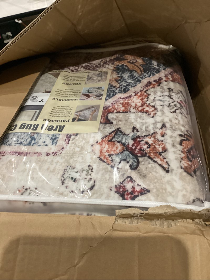 Condition photo showing Good Condition for champlant washable area rug 9'x12' beige blue boho chic medallion distressed design non-shedding easy care ideal for high traffic areas in living room bedroom office coffee table large carpet