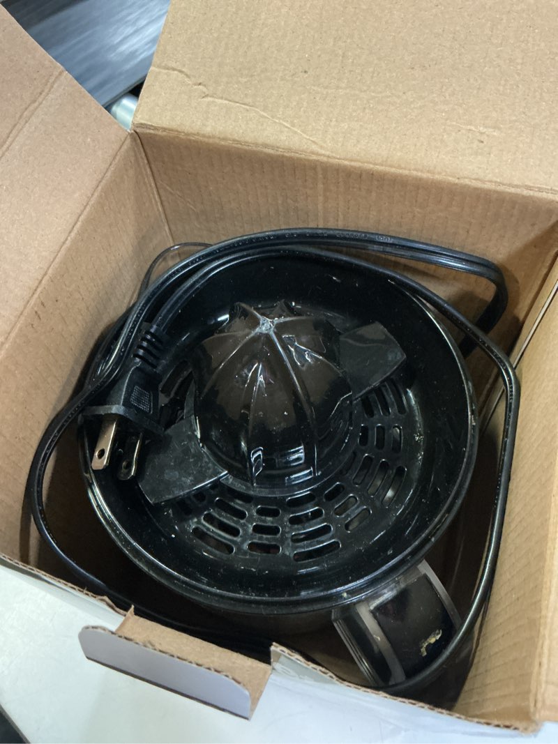 Condition photo showing As Is for elite gourmet ets326 bpa-free 40-watt electric citrus juicer, compact, large volume, pulp control, oranges, lemons, limes, grapefruits with easy pour spout, 24oz, black/stainless steel 24 ounce