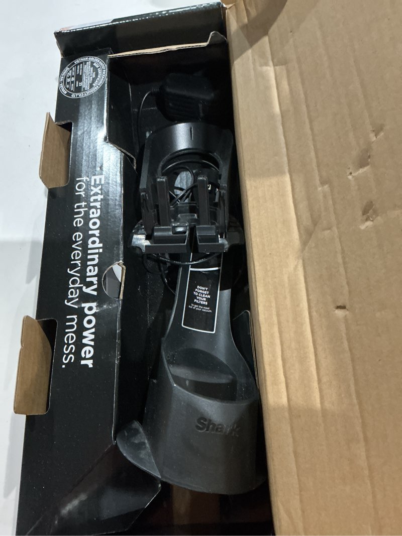 Condition photo showing As Is for shark wv201 wandvac handheld vacuum, lightweight at 1.4 pounds with powerful suction, charging dock, single touch empty and detachable dust cup,graphite, slate