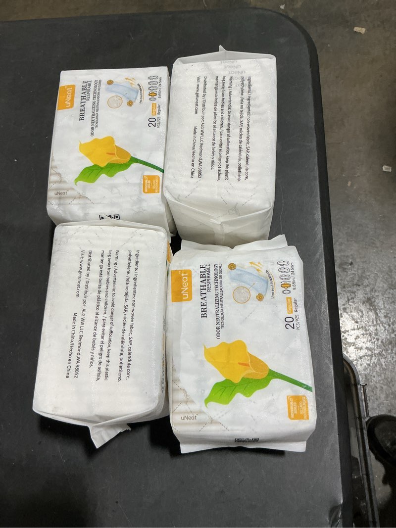 Condition photo showing New/Like New for uNeat Ultra Thin Pads with Wings for Women, Sanitary Napkins for Teen and Tweens, Regular Absorbency, Unscented, Eliminates Odor (Regular, Size 2, 80 Count