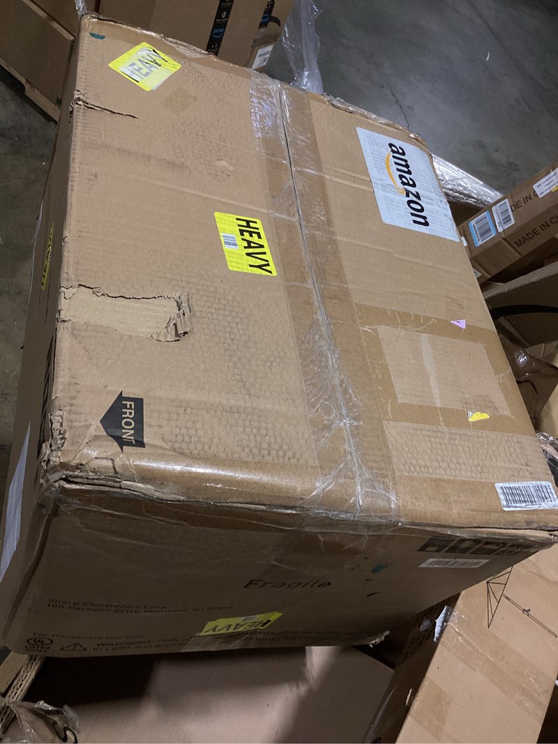 Condition photo showing As Is for sharp smc1161kw oven with removable 12.4" carousel turntable, cubic feet, 1000 watt countertop microwave, 1.1 cuft, white