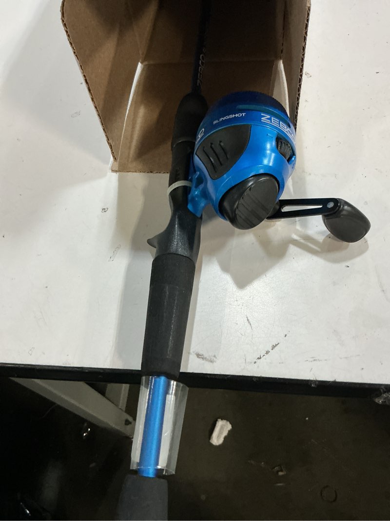 Condition photo showing Good Condition for zebco slingshot spincast reel and fishing rod combo, 5-foot 6-inch 2-piece fishing pole, size 30 reel, right-hand retrieve, pre-spooled with 10-pound zebco line
