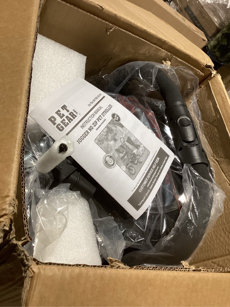 Condition photo showing As Is for Pet Gear No-Zip Jogger Pet Stroller for Cats/Dogs, Zipperless Entry, Airless Tires, Easy One-Hand Fold, Cup Holder + Storage Basket, Navy