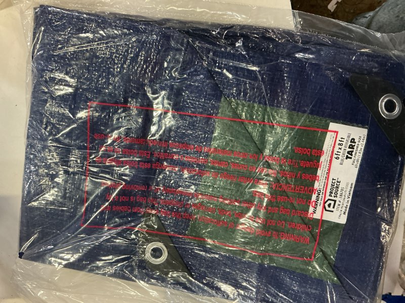 Condition photo showing As Is for project source 6-ft x 8-ft blue waterproof standard polyethylene 5-mil tarp