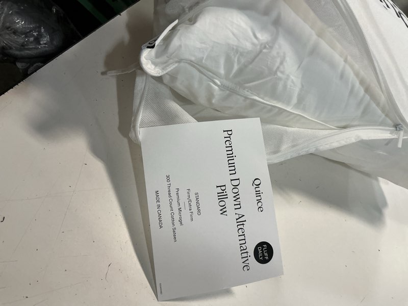 Condition photo showing As Is for  premium down alternative pillow standard white 