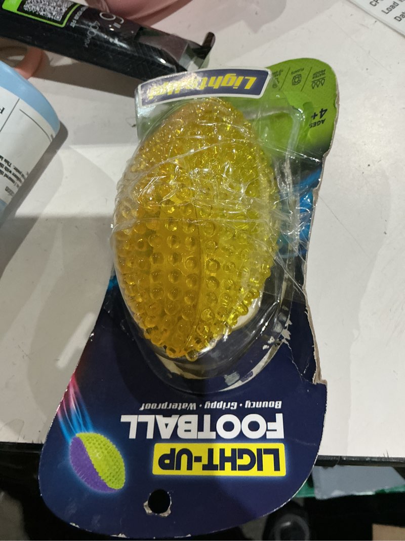 Condition photo showing Good Condition for best brands light up toss football, color may vary, ages 4 and up
