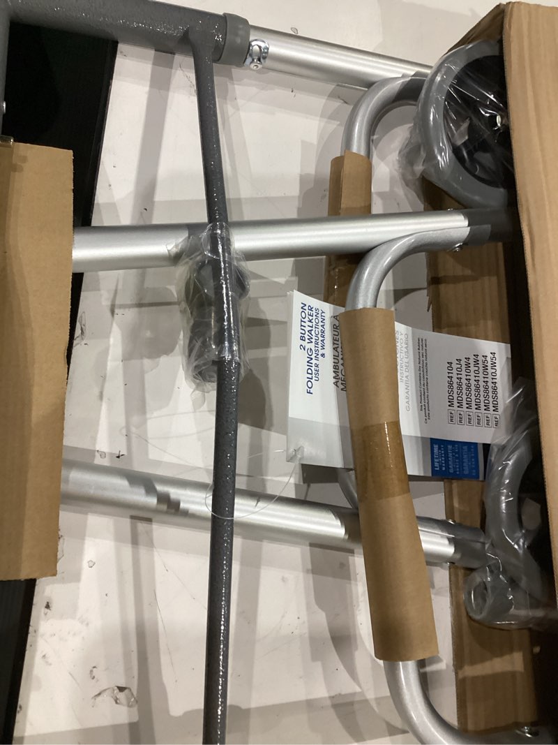 Condition photo showing Good Condition for medline two-button folding walker for seniors, 5" wheels, 32.5" to 38.5" height, 300-lb. capacity metallic 1 count (pack of 1)