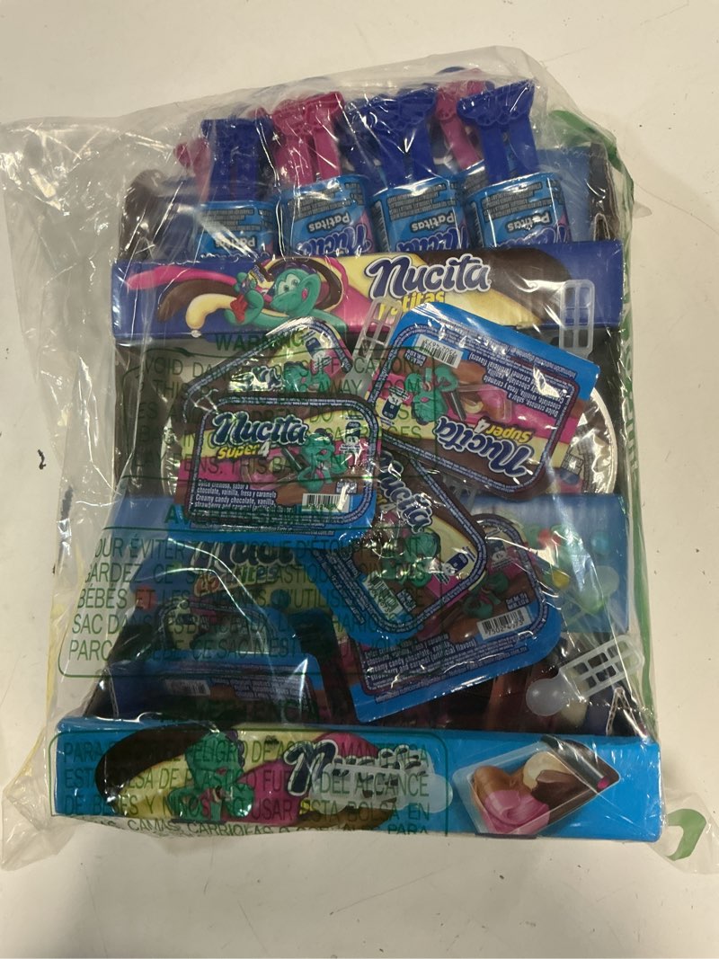 Condition photo showing Good Condition for (best by april 2026) nucita assorted | nucita super 4, nucita patitas, and nucita confites | creamy candy for children | ready to display 18.41 oz 18.41 ounce (pack of 1) mini shipper