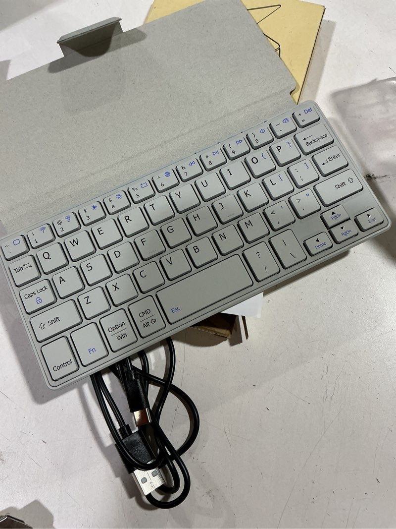 Condition photo showing Good Condition for CACOE Wireless Keyboard with Stand, Mini Keyboard for Cell Phone, Ultra-Slim Portable, Foldable, Dual-Channel QWERTY with Stand Holder for Smartphone and More iOS Android Windows, Grey Grey-2