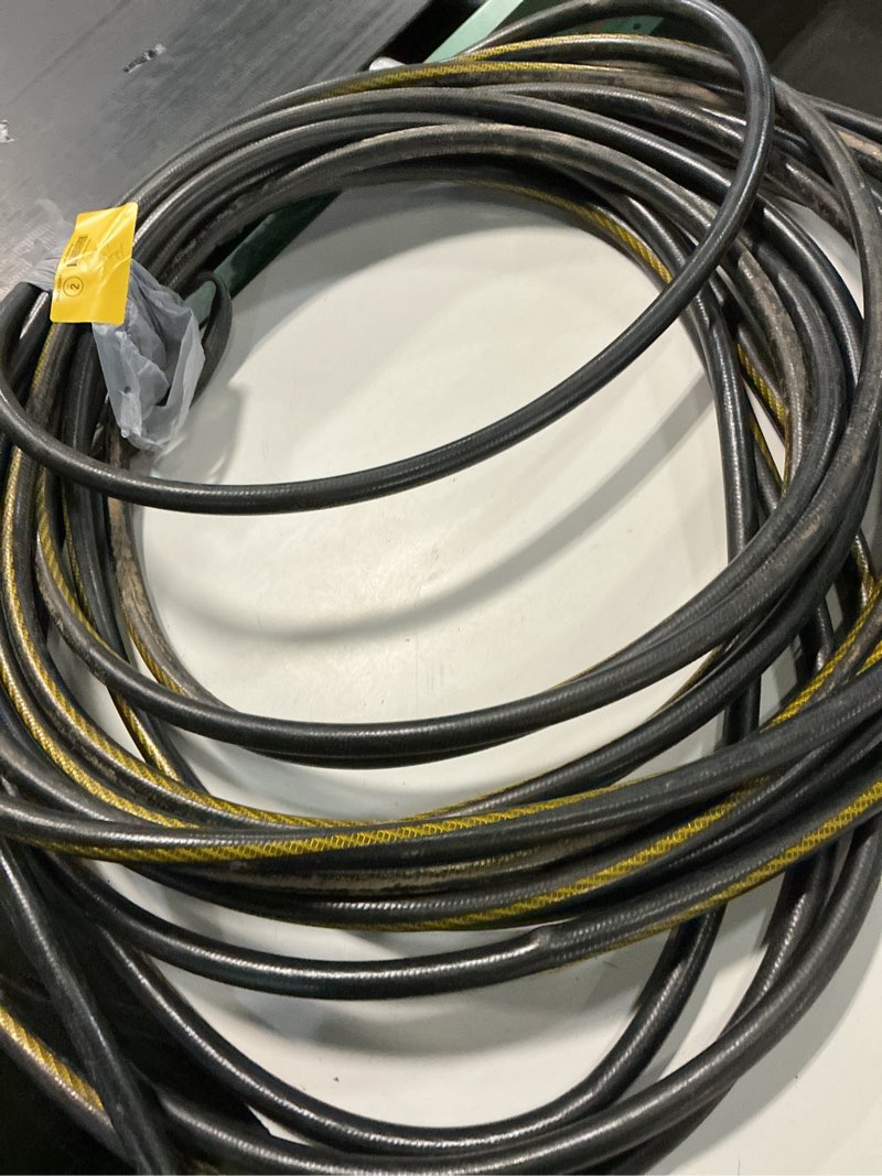 Condition photo showing As Is for neverkink teknor apex 5/8-in x 75-ft heavy -duty kink free vinyl gray coiled hose