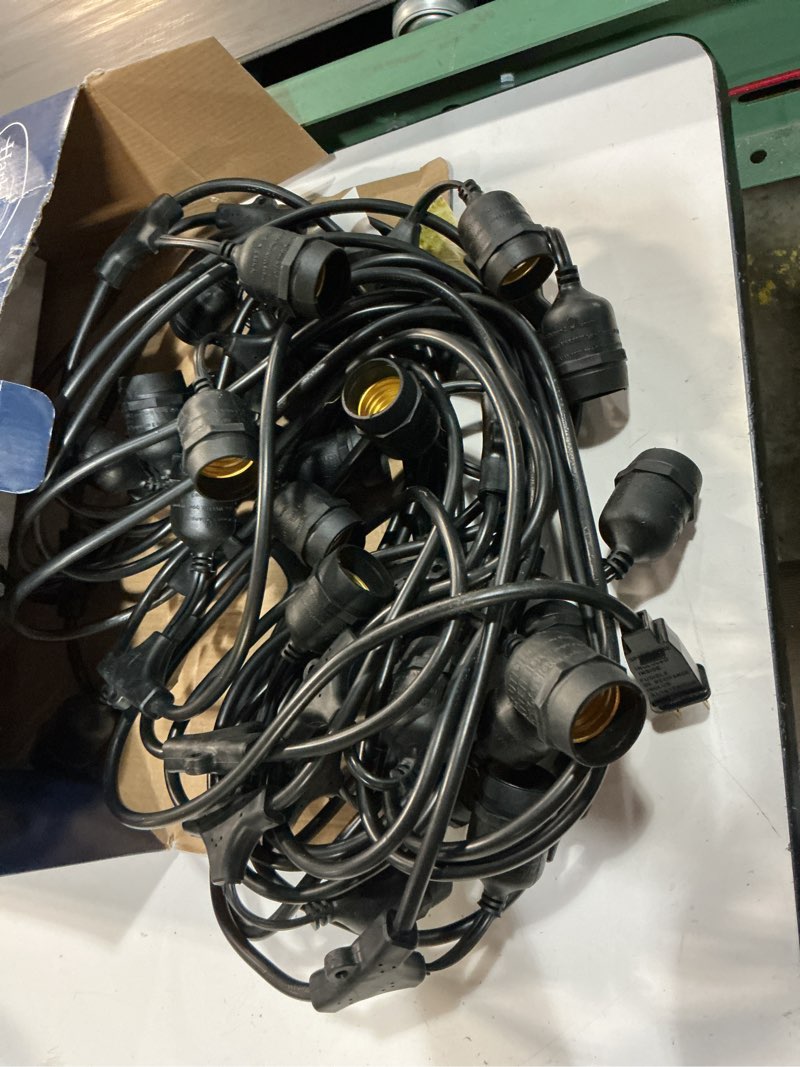 Condition photo showing As Is for harbor breeze 48-ft plug-in black indoor/outdoor string light with 24 white -light led edison bulbs