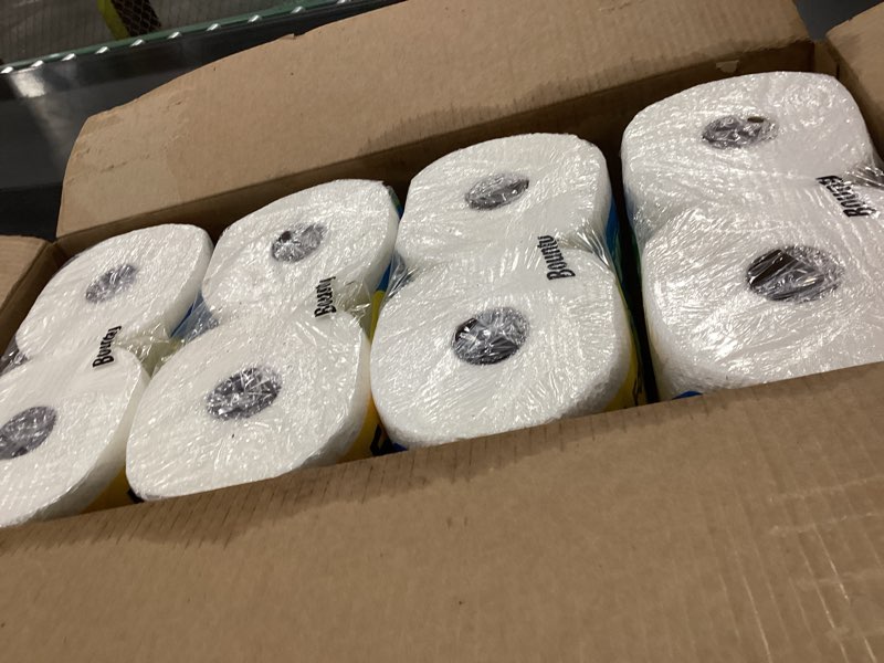 Condition photo showing New/Like New for 4 packs of 2 family roll bounty paper towels