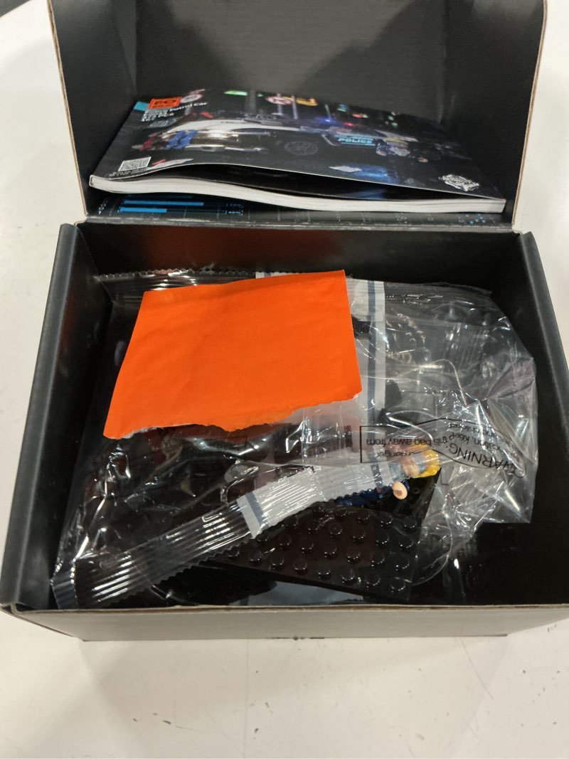 Condition photo showing As Is for funwhole police patrol car lighting building-bricks set - cyberpunk city car chase playkit with officer 372 pcs stem toys