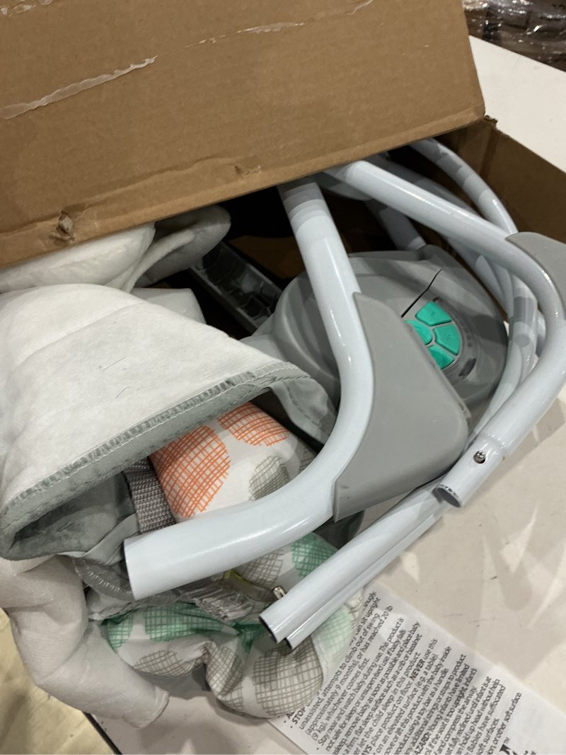 Condition photo showing As Is for bright starts portable automatic 6-speed baby swing with adaptable speed, taggies, music, removable-toy-bar, 0-9 months 6-20 lbs (whimsical wild)