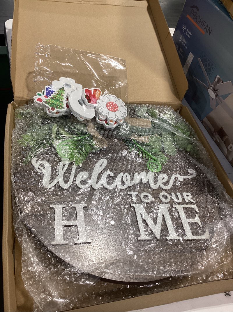 Condition photo showing Good Condition for Interchangeable Seasonal Welcome Sign Front Door Decoration, Rustic Round Wood Wreaths Wall Hanging Outdoor, Farmhouse, Porch, for Spring Summer Fall All Seasons Holiday Halloween Christmas. 01blown 12 Inch