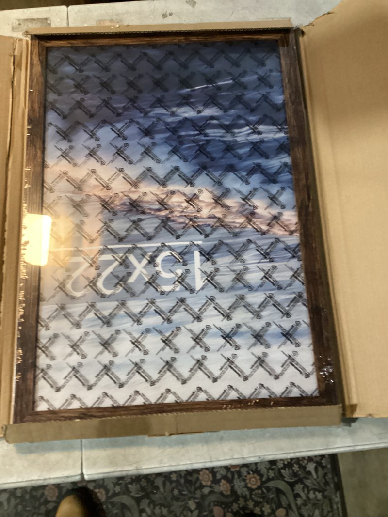 Condition photo showing New/Like New for 15x22 Picture Frame, Classic Brown 15 x 22 Poster Frame for Horizontal or Vertical Wall Mounting, 1 Pack