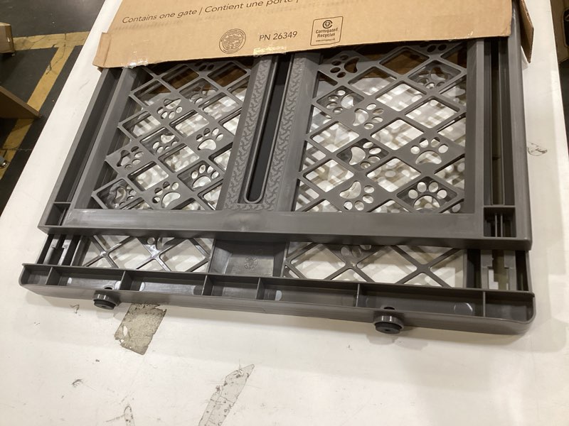 Condition photo showing New/Like New for mypet north states paws portable pet gate: 26-40" wide. pressure mount. no tools needed. made in usa, 23" tall, expandable, durable dog gates for doorways, fieldstone gray