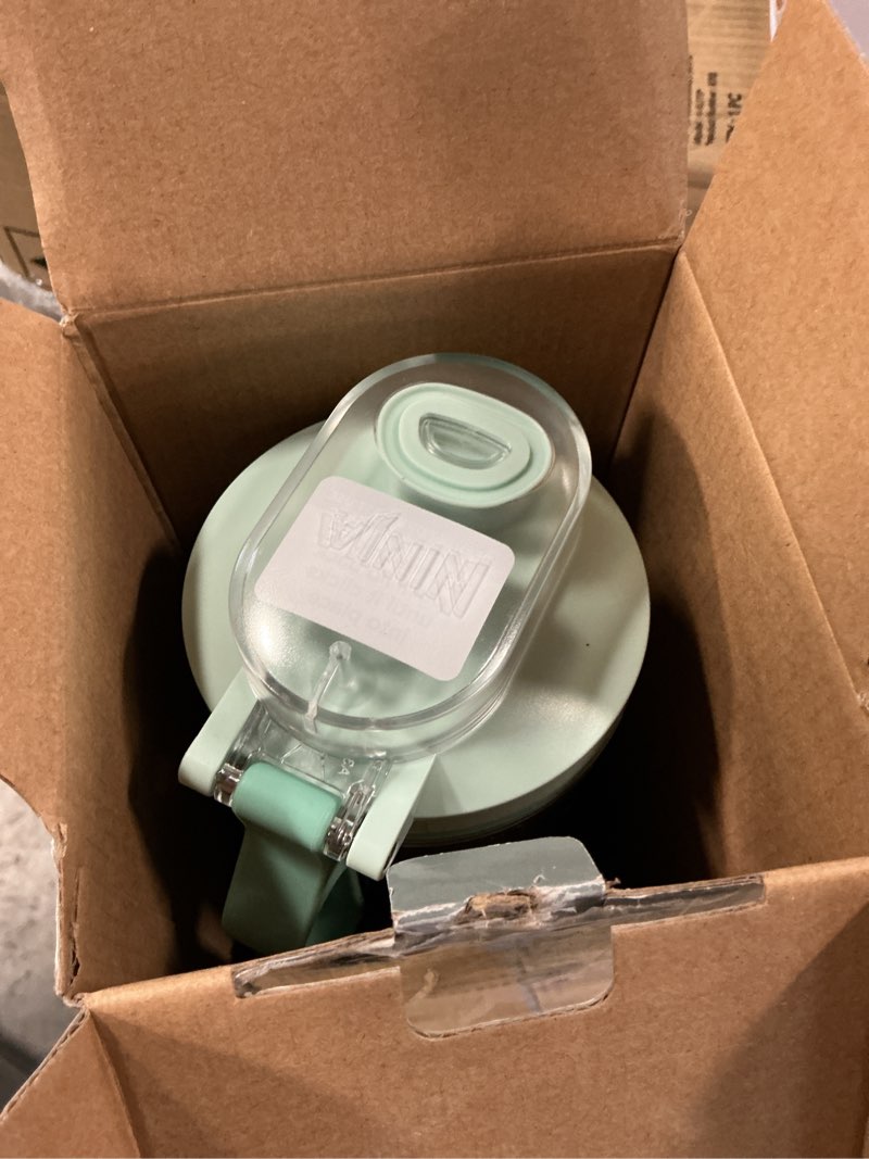 Condition photo showing As Is for ninja blast max, portable blender + twist & go, personal smoothie, blend, ice crush, 3 programs, cordless, 22oz removable vessel, dishwasher safe, leakproof, sea glass, bc251mt