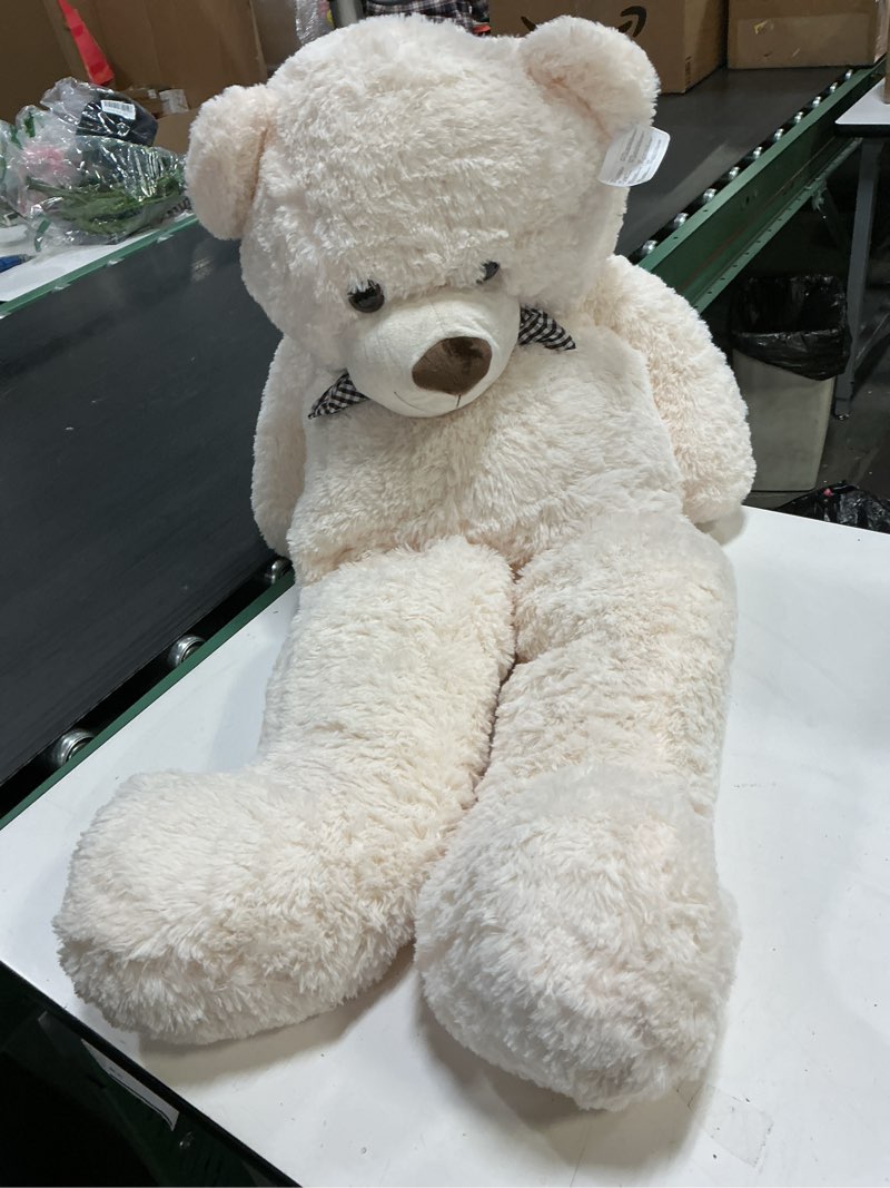 Condition photo showing Good Condition for Poutmac 47 inch Giant Teddy Bear Stuffed Animal White Big Plush Teddy Bear Valentine's Gift for Girlfriend Soft Stuffed Bear Animals for Christmas,Birthday,Mother's Day