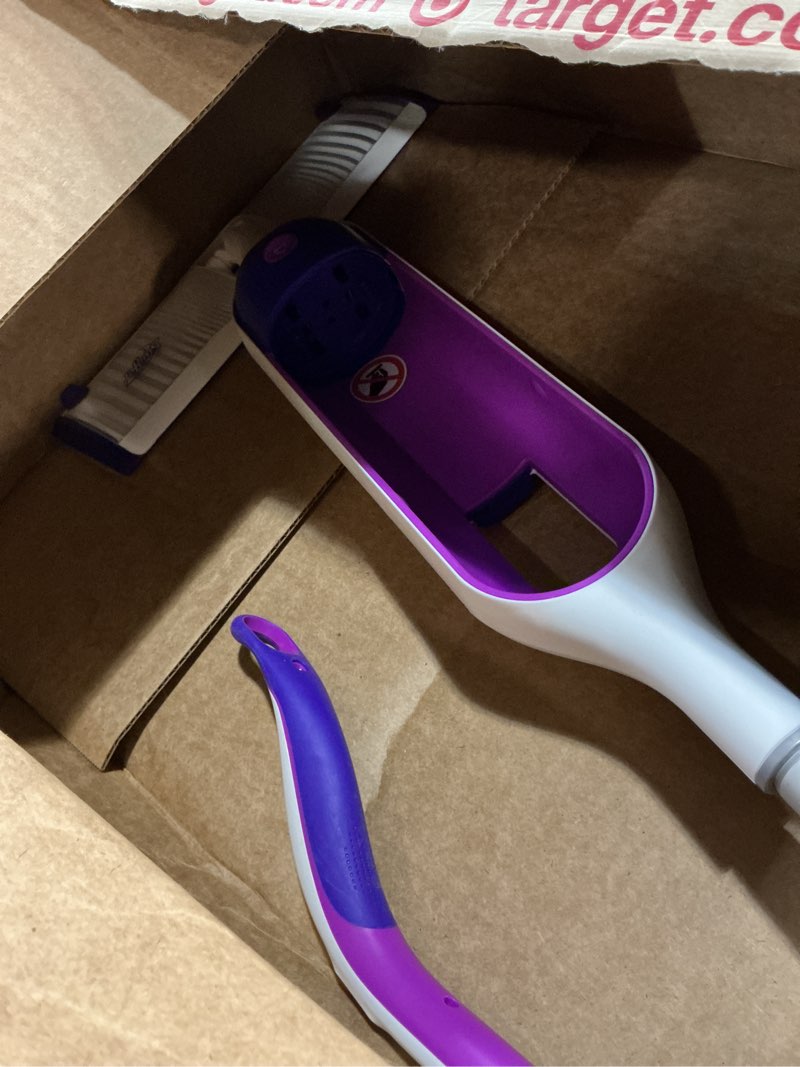 Condition photo showing As Is for swiffer powermop multi-surface mop kit for floor cleaning, includes powermop, 2 mopping pad refills, 1 cleaning solution with fresh scent and 2 batteries purple and white