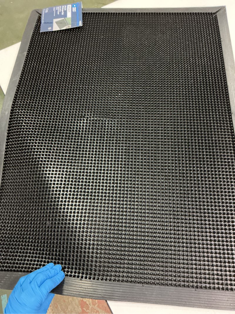 Condition photo showing As Is for Project Source 23.75-in x 31.70-in Black Rubber Non-Slip Grip Indoor or outdoor Utility Mat