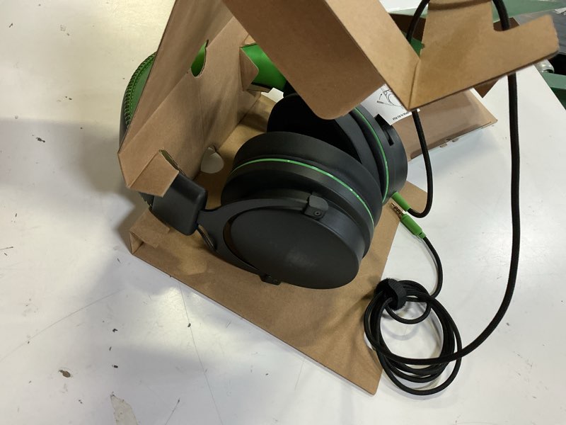 Condition photo showing Good Condition for onn wired gaming headset compatible with xbox, black and green