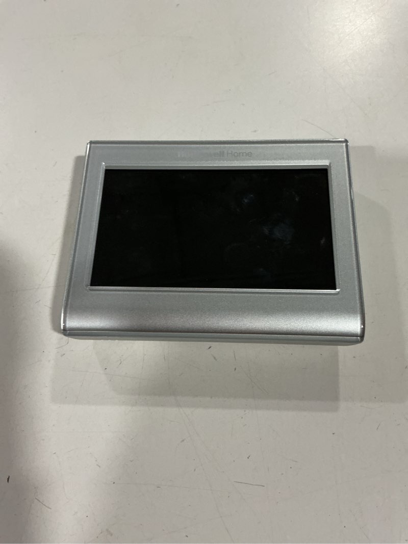 Condition photo showing As Is for honeywell home silver smart compatible thermostat with wi-fi compatibility