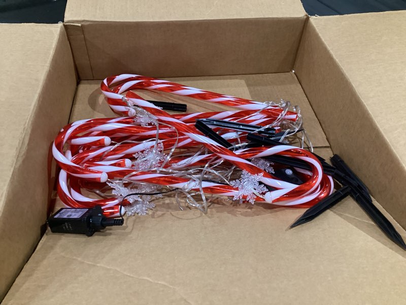 Condition photo showing Good Condition for (NOT TESTED) Hiboom 12 Pcs Christmas Candy Cane Light with 4 Christmas Theme Music, 20'' Pathway Markers Lights with Stakes Holiday Driveway Light for Xmas Holiday Party Walkway Garden Decor(Red, White)
