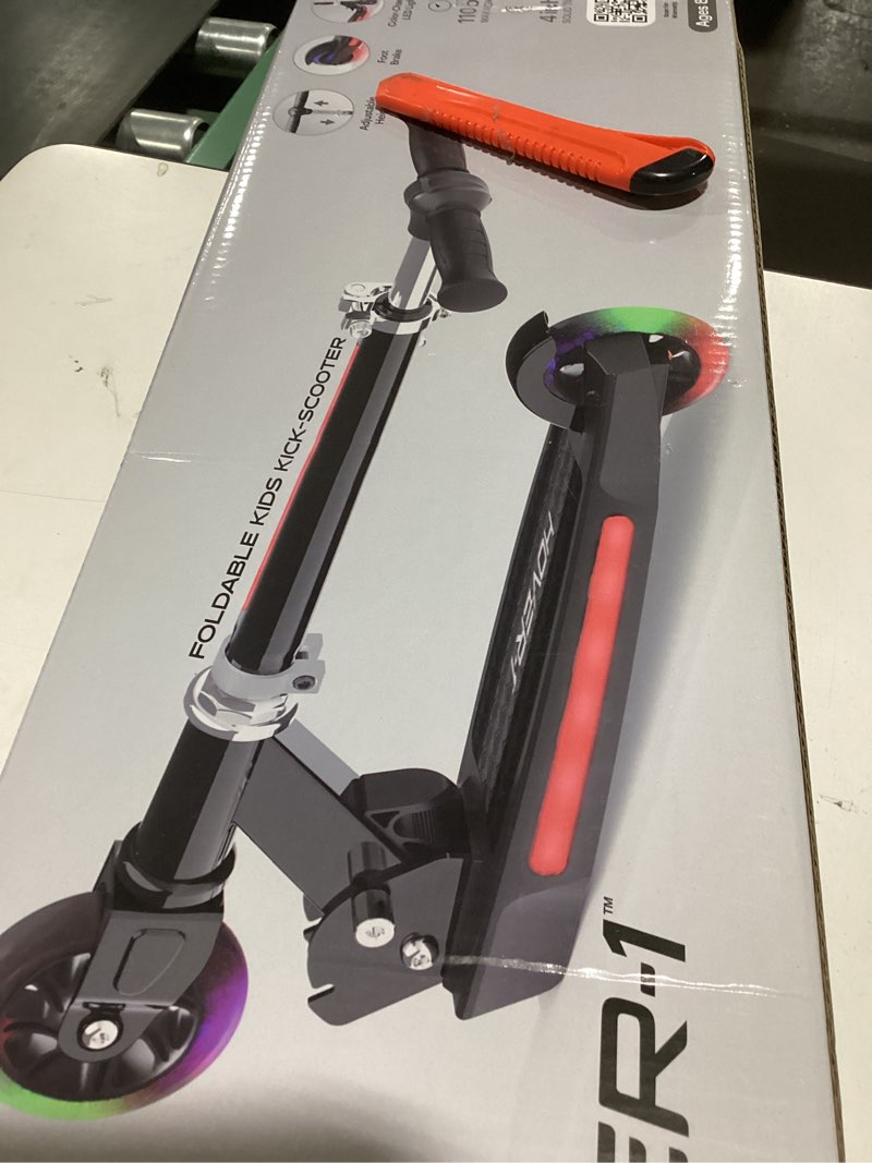 Condition photo showing As Is for (MISSING PIECES)Hover-1 Lunar Kids Folding Kick Scooter with Color-Changing LED Light Up Wheels, Foot Brake, Adjustable Height Handle, and Light Weight Design Black