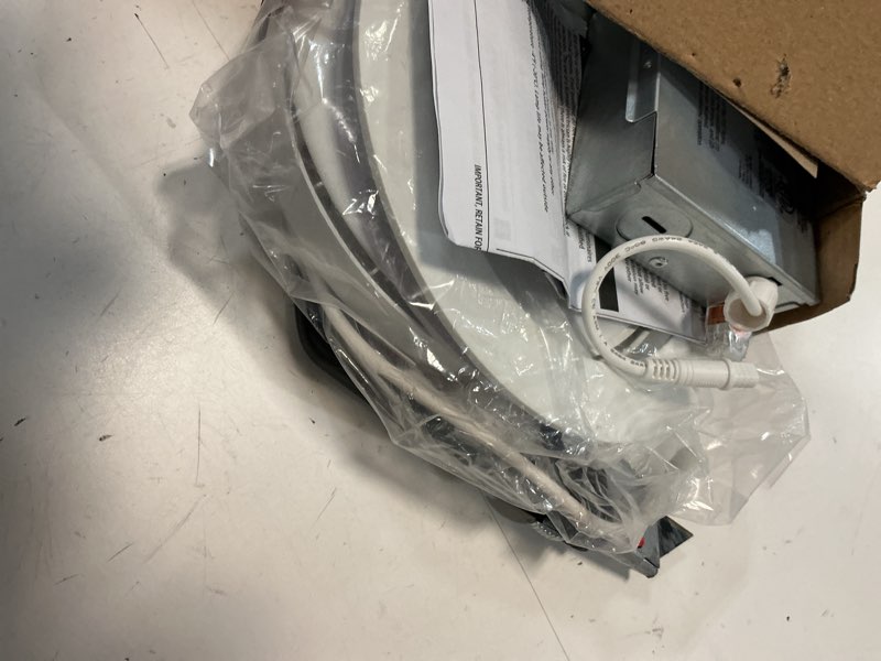 Condition photo showing As Is for utilitech white 6-in 650 -lumens switchable white round dimmable led canless wet rated recessed downlight