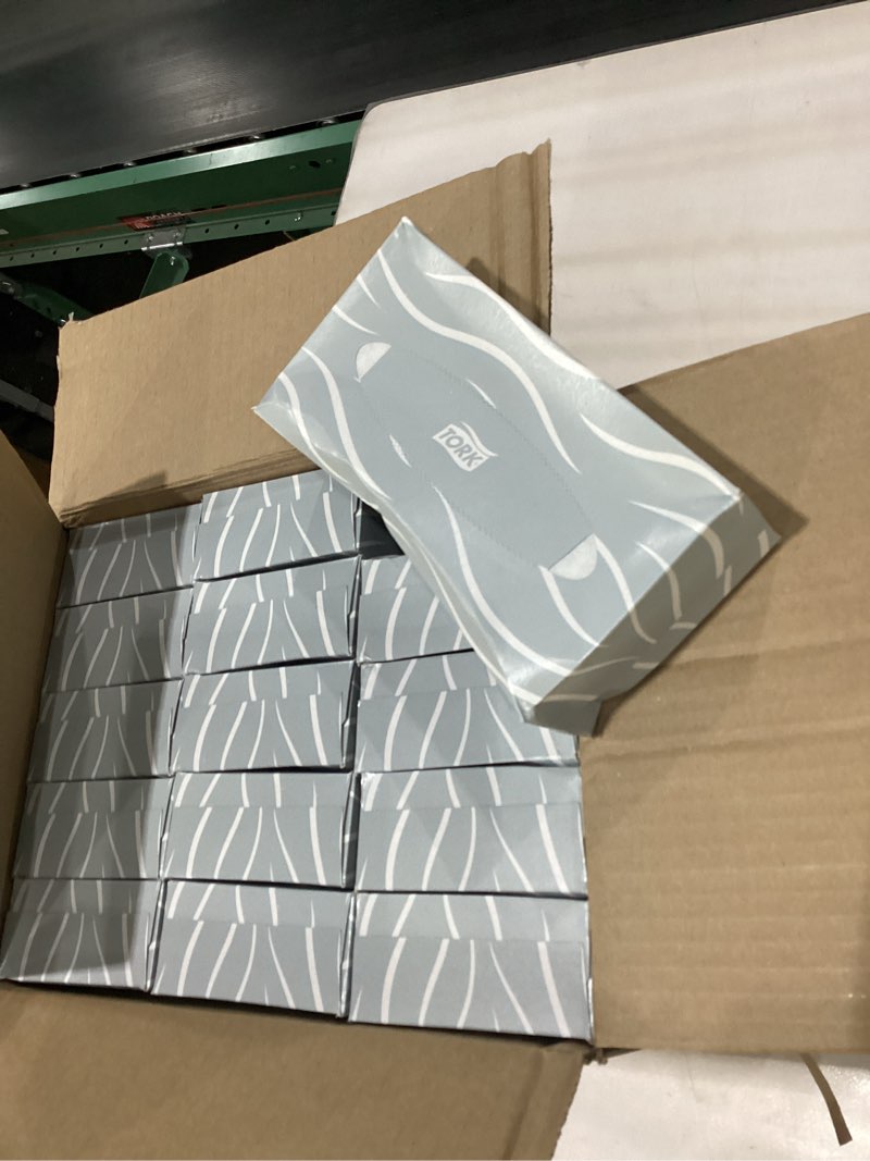 Condition photo showing As Is for Tork facial tissue 