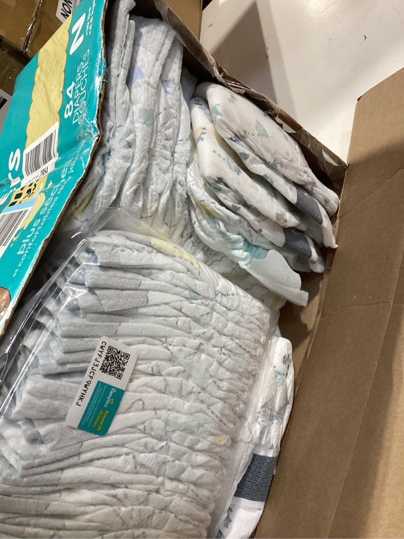 Condition photo showing As Is for pampers swaddlers diapers newborn - size 0, 84 count, ultra soft disposable baby diapers
