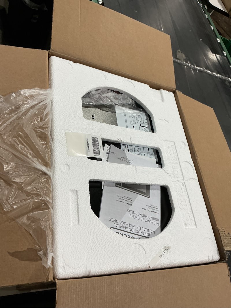 Condition photo showing As Is for black+decker em720cb7 digital microwave oven with turntable push-button door, child safety lock, 700w, stainless steel, 0.7 cu.ft 0.7 cu. ft.